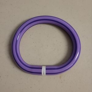 Avon purple stripe bracelet, made with plastic.